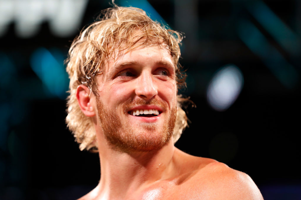 Logan Paul Tore His ACL While Fighting Roman Reigns At WWE Crown Jewel