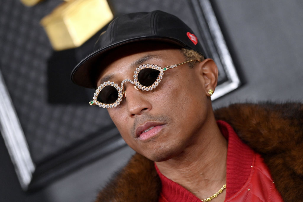 Pharrell Williams shows off his quirky style in a khaki blanket while  attending LFW