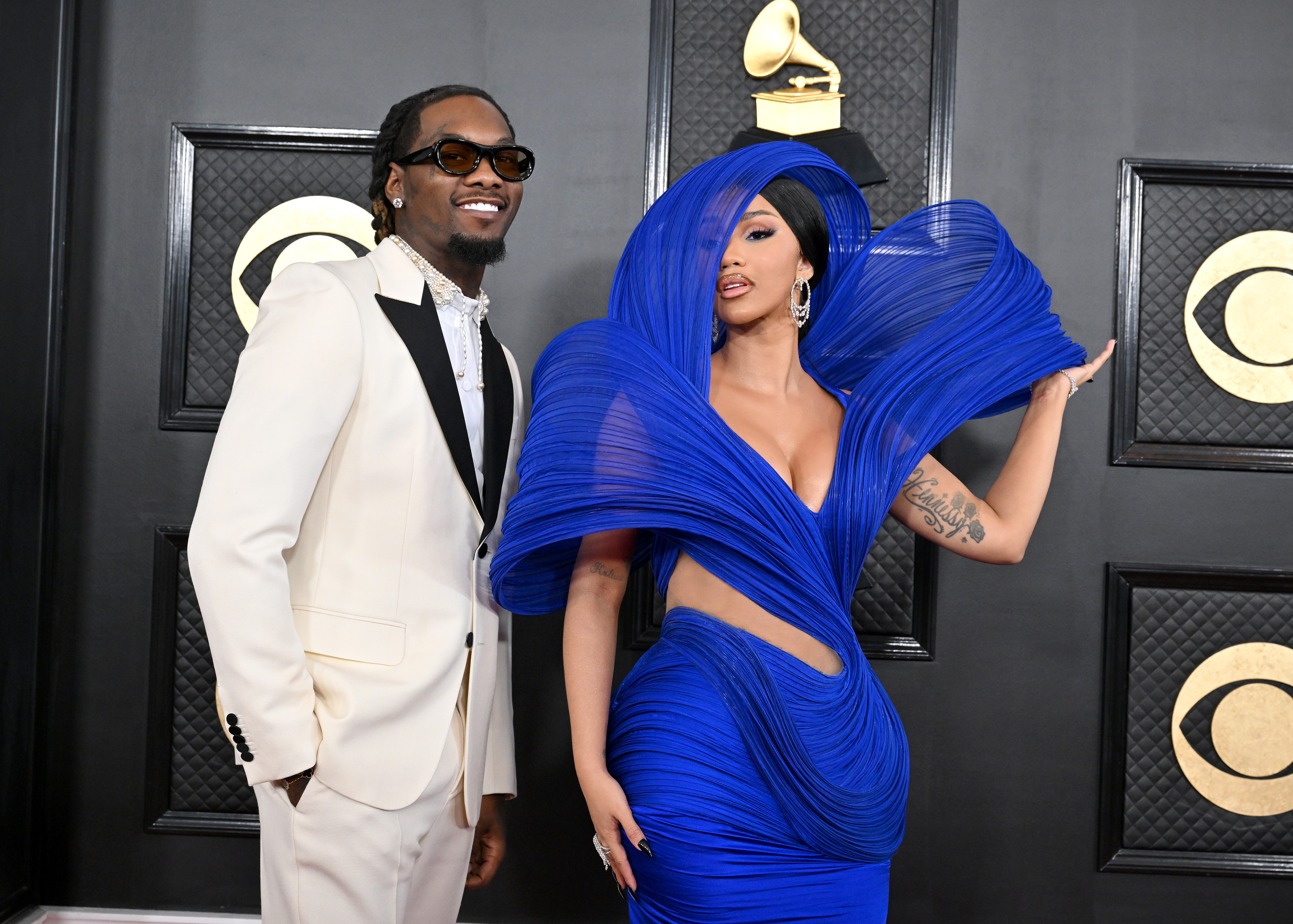 Cardi B & Offset Run To Catch Rihanna's Super Bowl Show, Perform