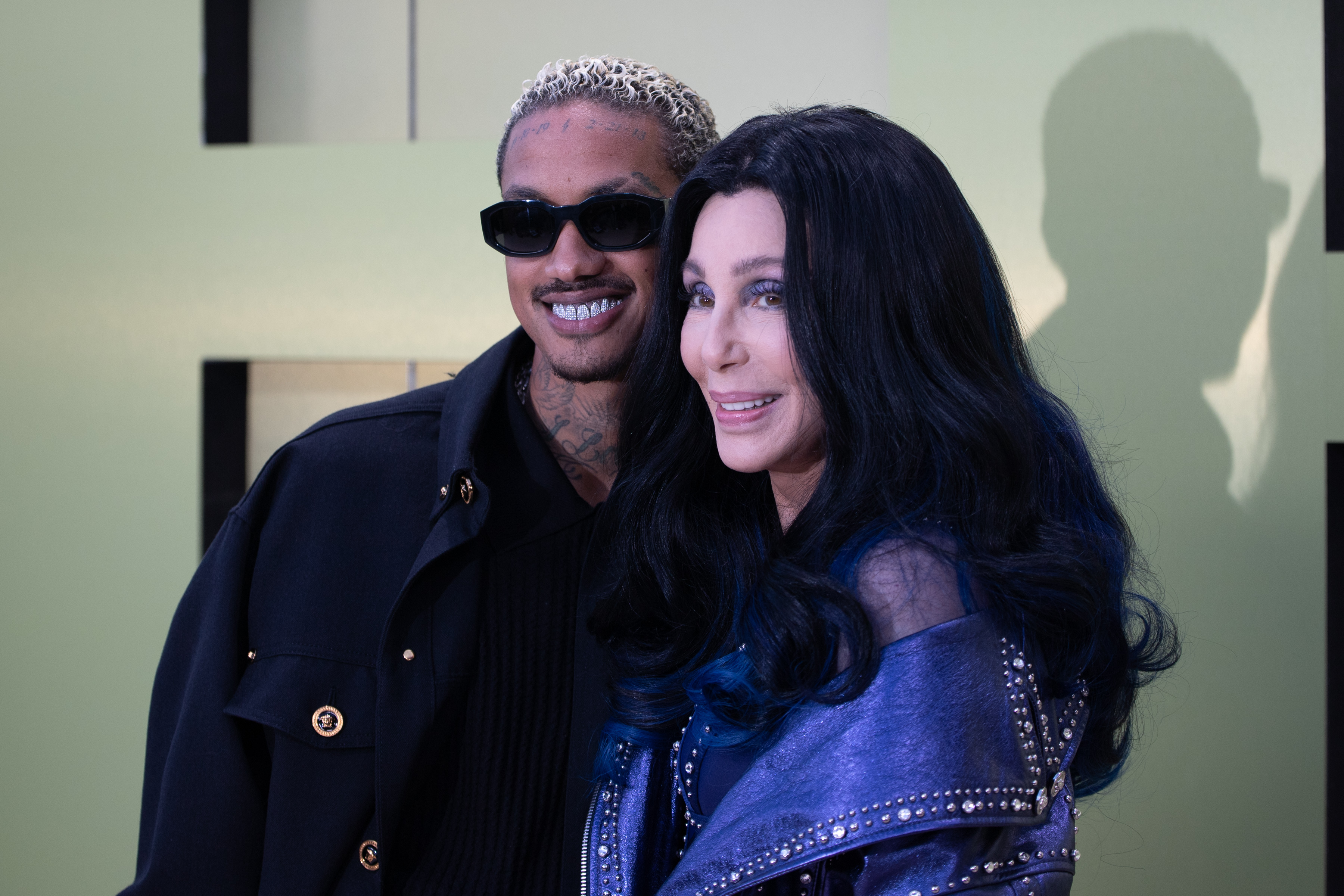 Cher & AE Edwards Share A Passionate Kiss During Red Carpet Debut