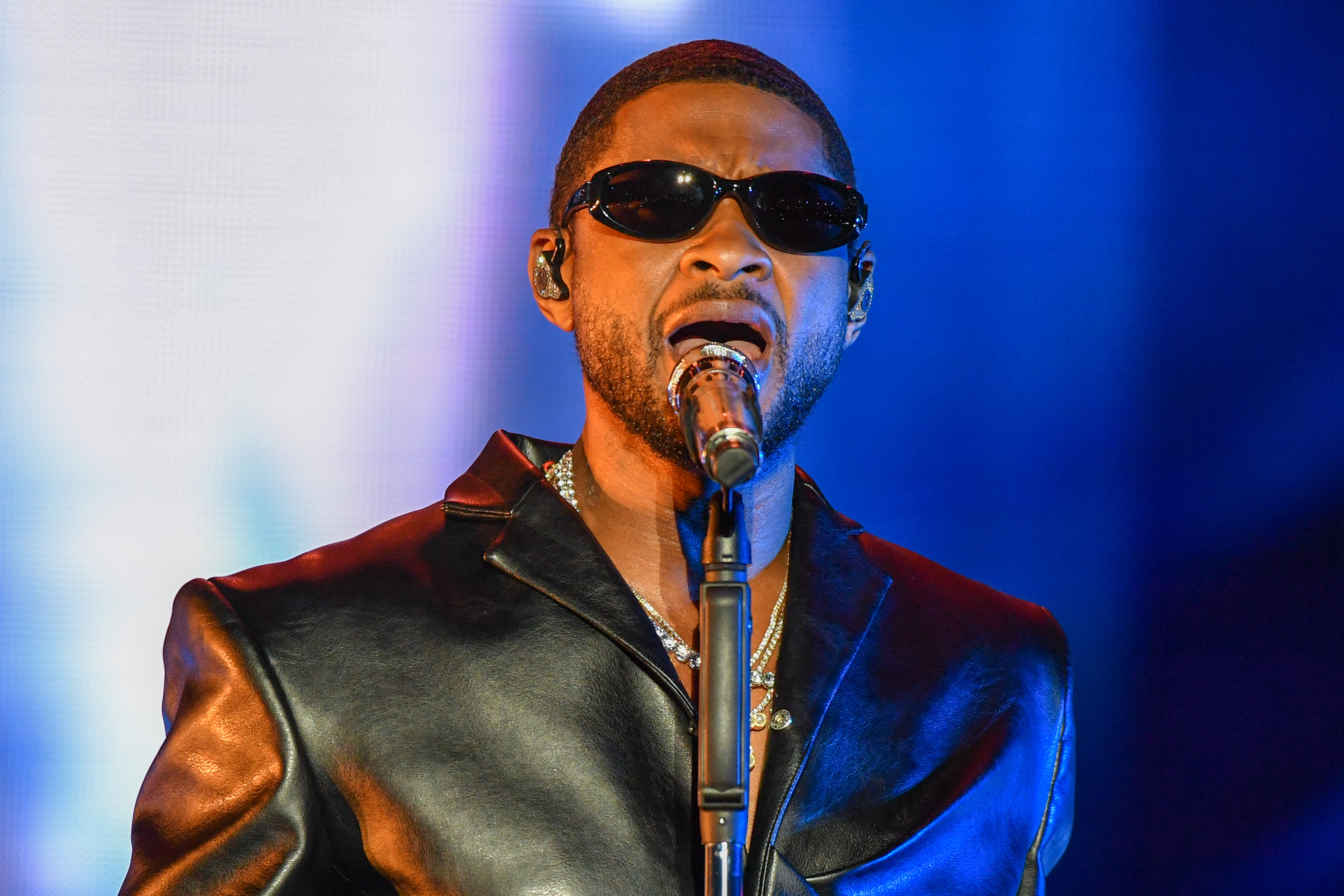 Usher Performs At Lovers & Friends After Chris Brown Fight