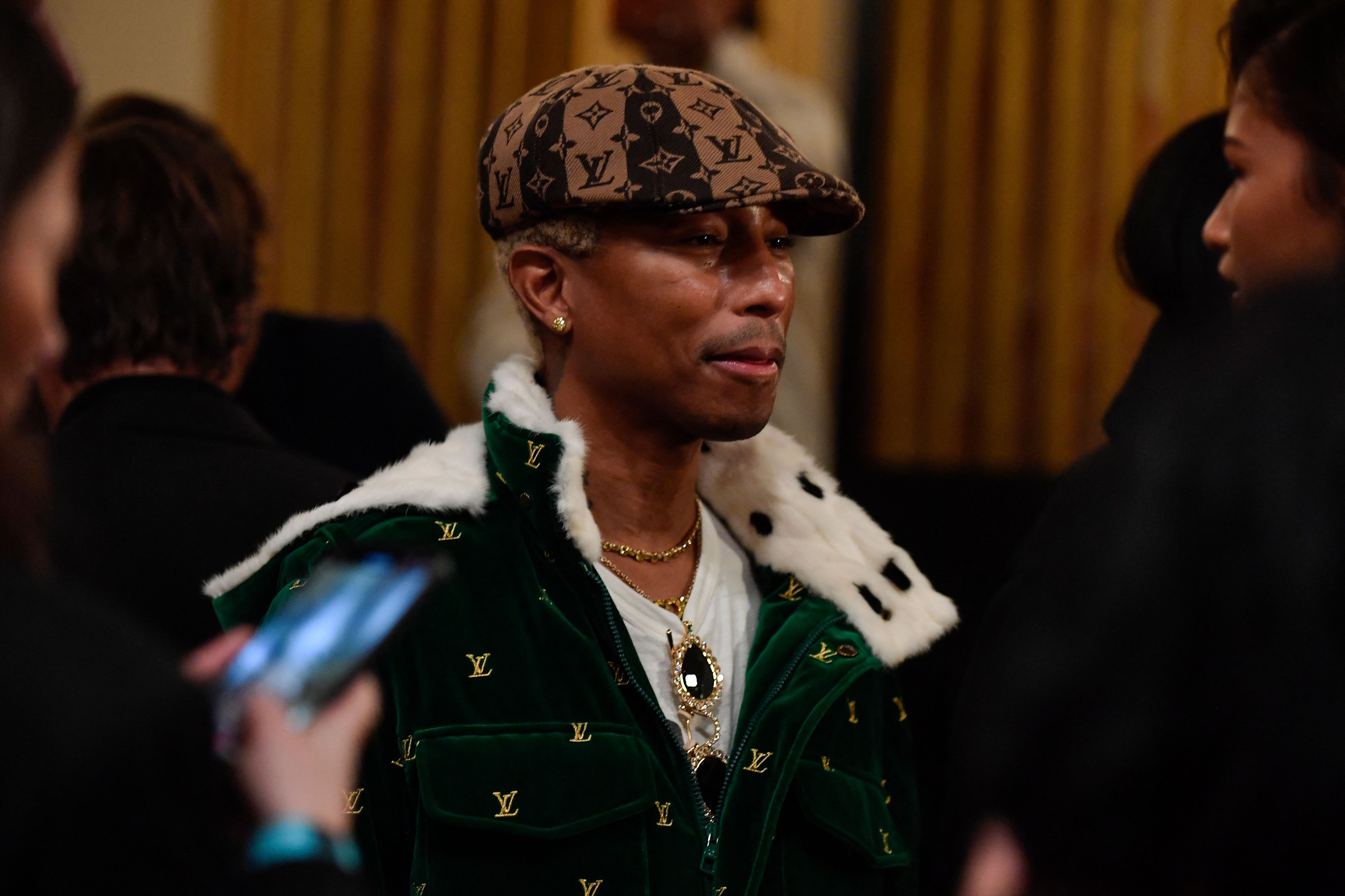 Pharrell Williams Unveils Debut Louis Vuitton Collection At Fashion Week