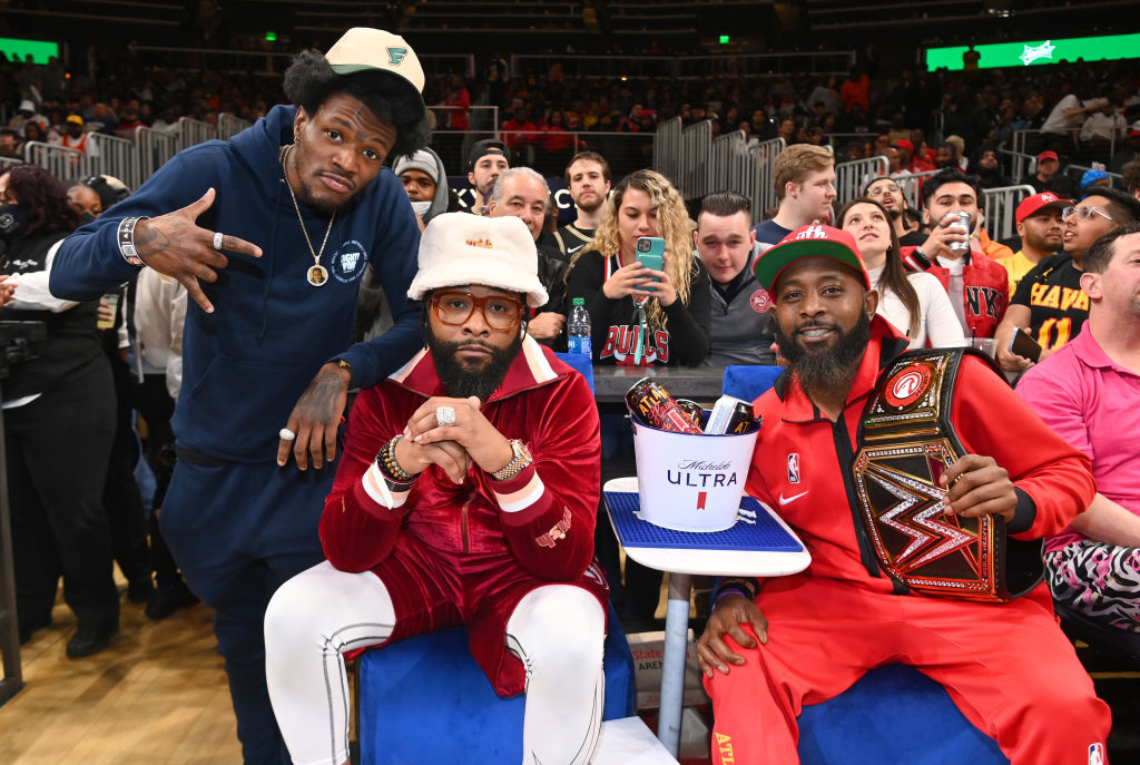 DC Young Fly, Chico Bean and Karlous Miller at Atlanta Hawks vs. Miami heat game in 2022. 