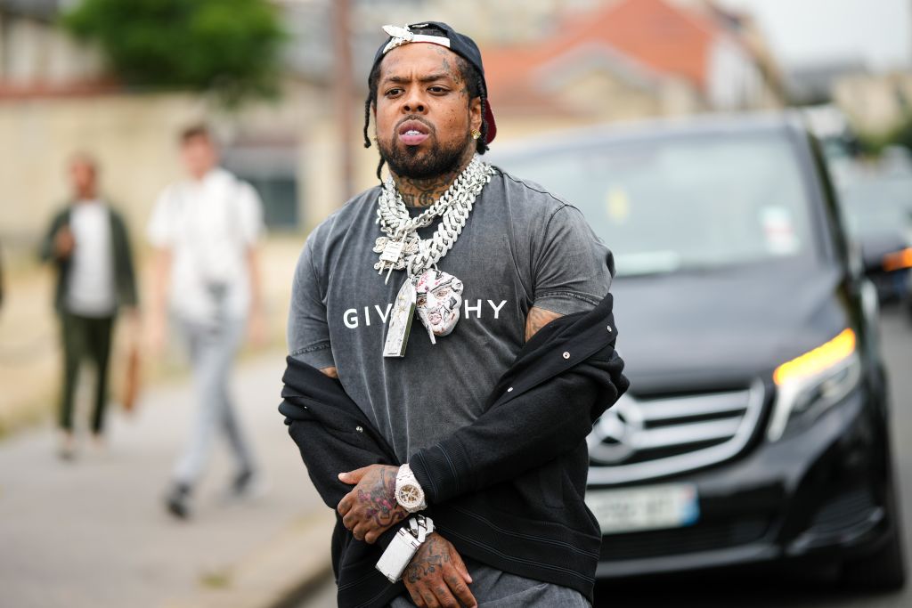 Westside Gunn pictures in France outside of Givenchy's Paris Fashion Week show. 