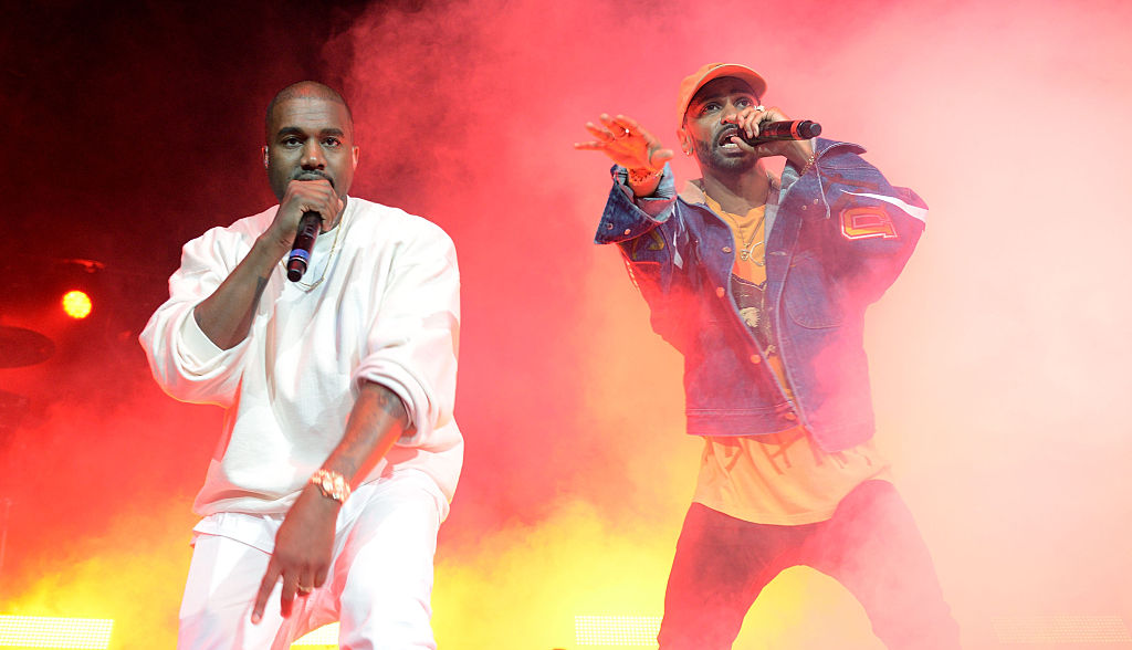 Big Sean with his mentor Kanye West on stage. 