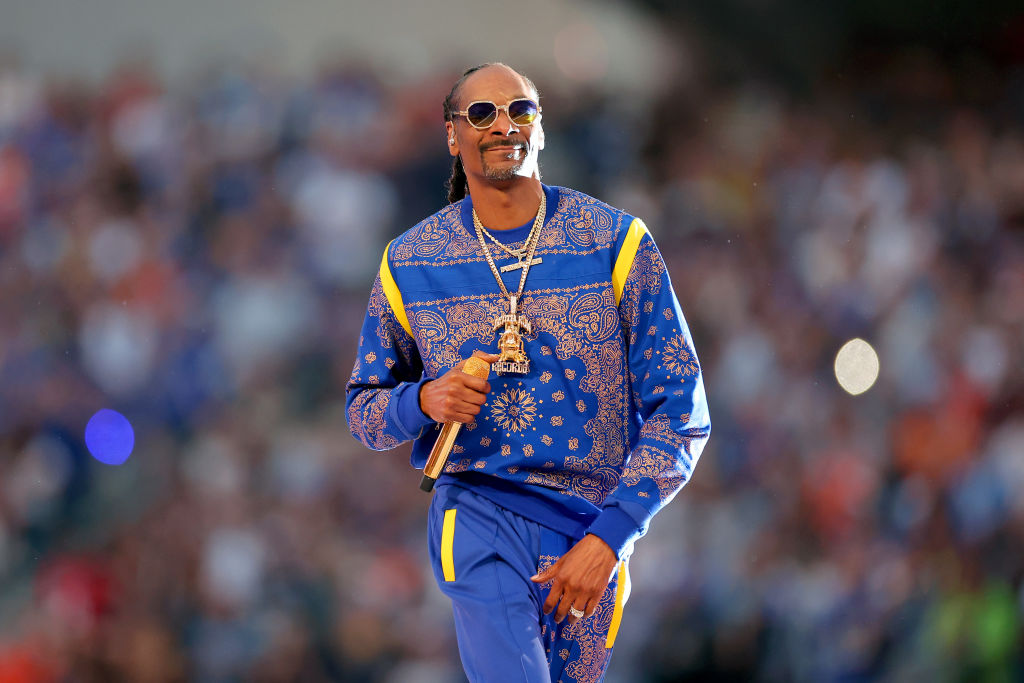 Rapper Snoop Dogg attends an NHL hockey game between Los Angeles