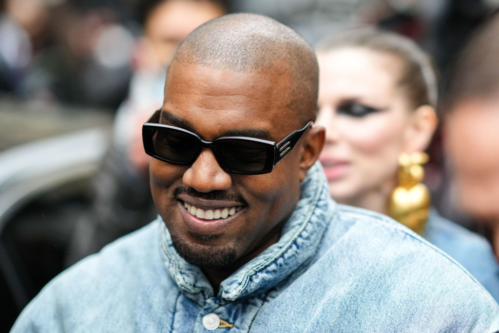 Kanye West Returns To Twitter With A Gold Check