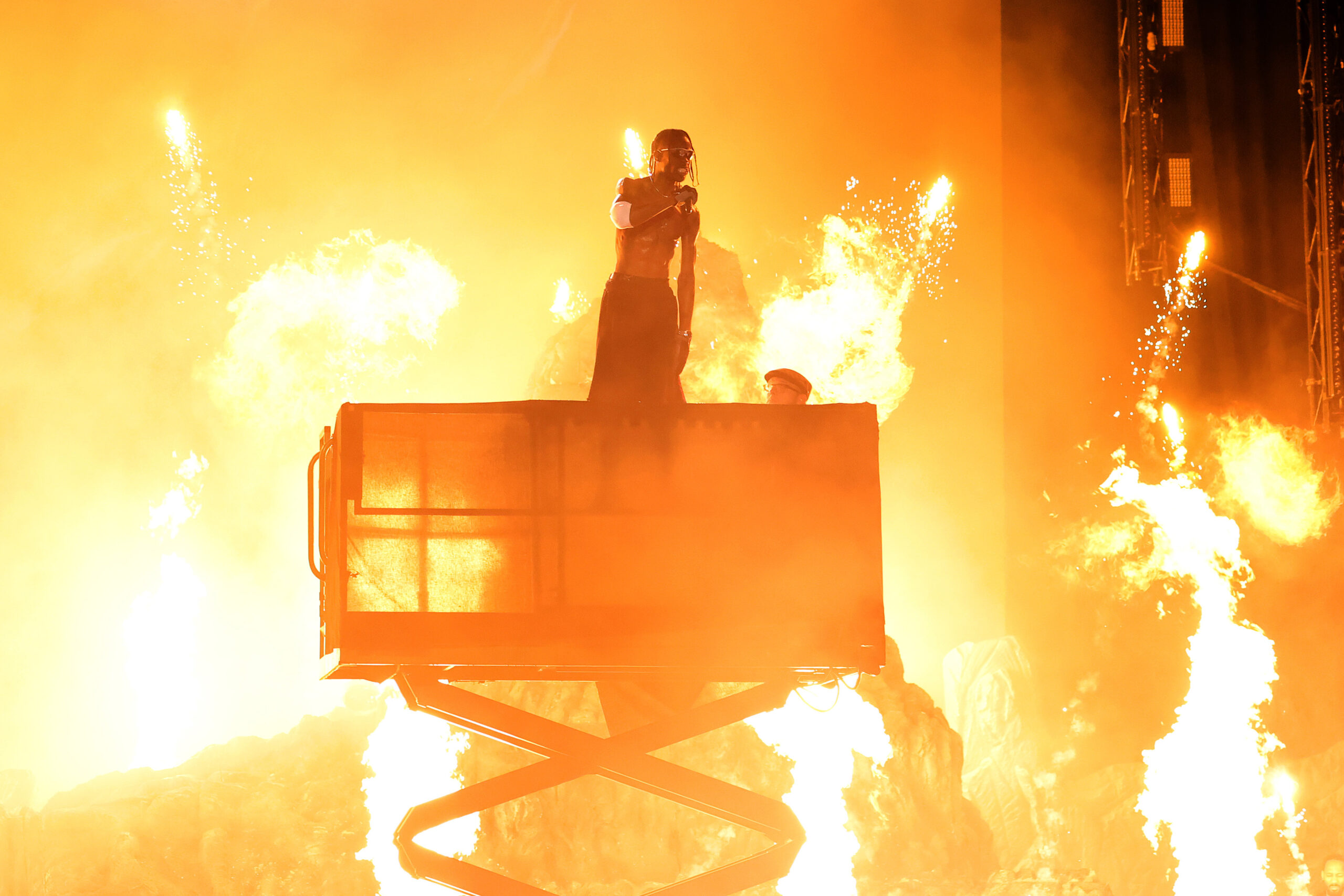Travis Scott Points To Utopia, Texas In New Billboard