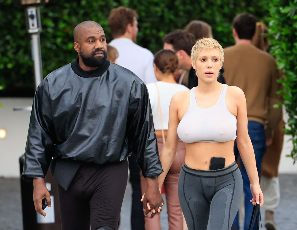 Bianca Censori Swaps See-Through Tights For Shorts As Kanye West Flashes The Cameras Again