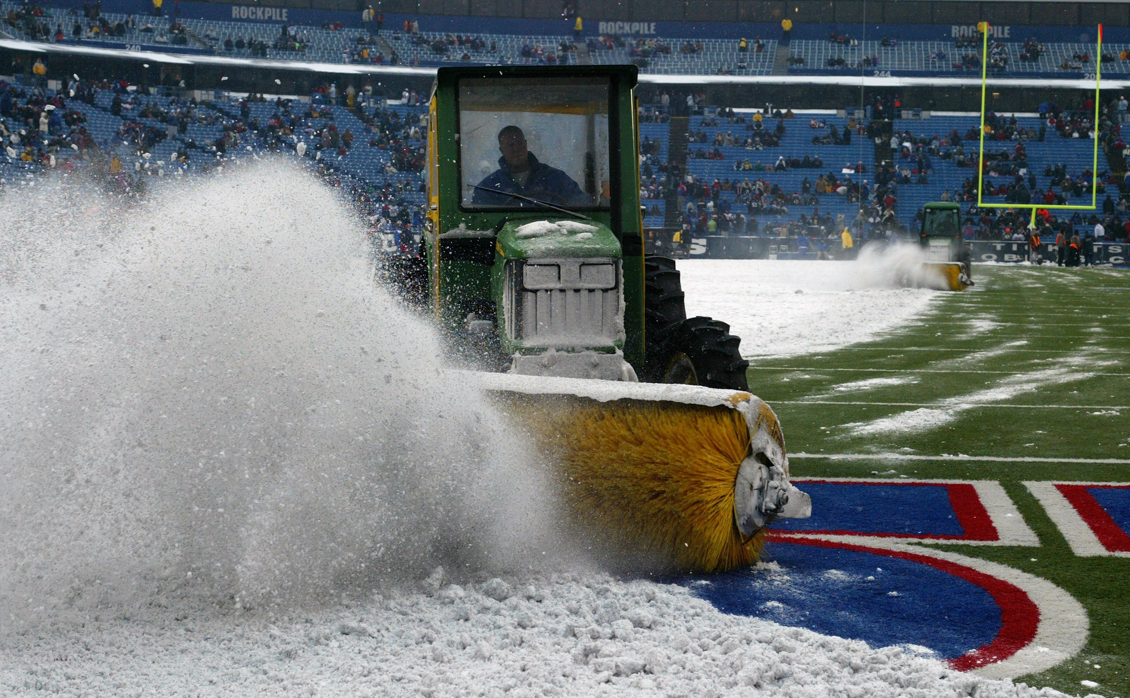 Snow covered Colts vs. Bills game action photos