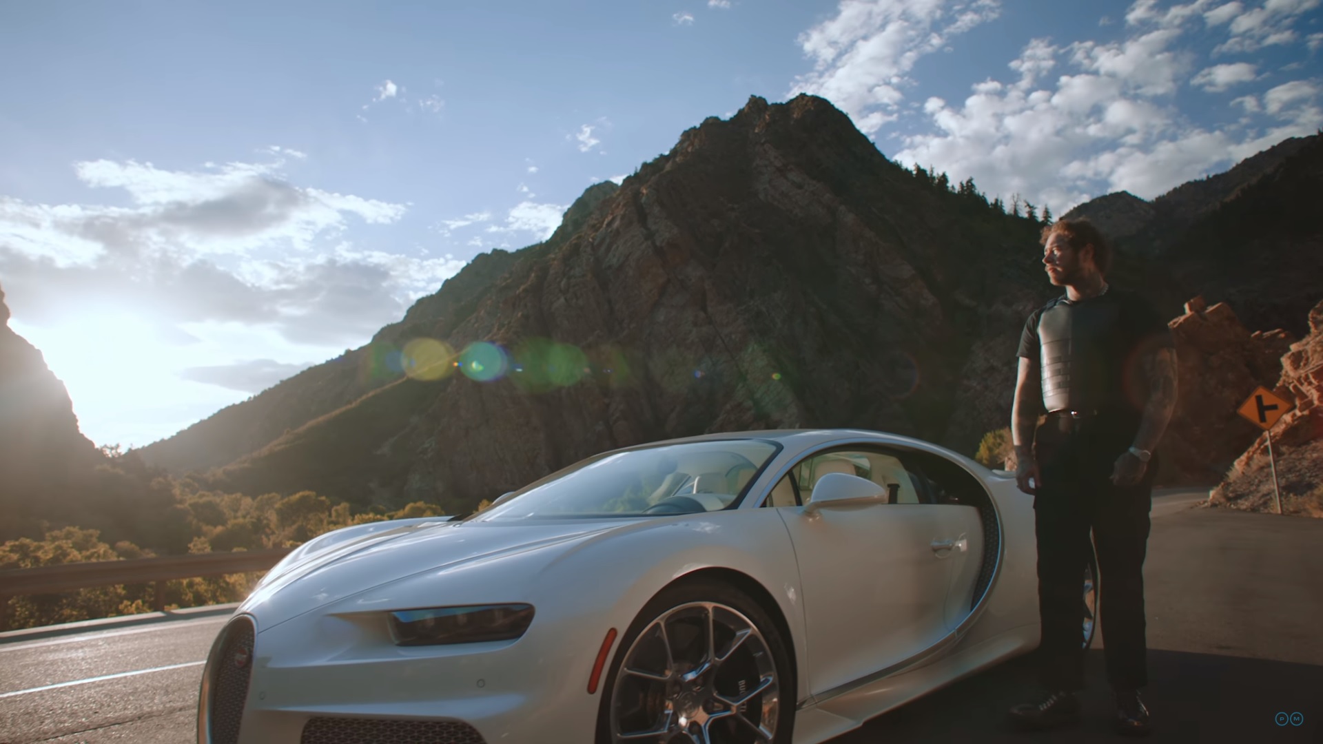 Post Malone stunts in the mountains in his 'Saint-Tropez' video