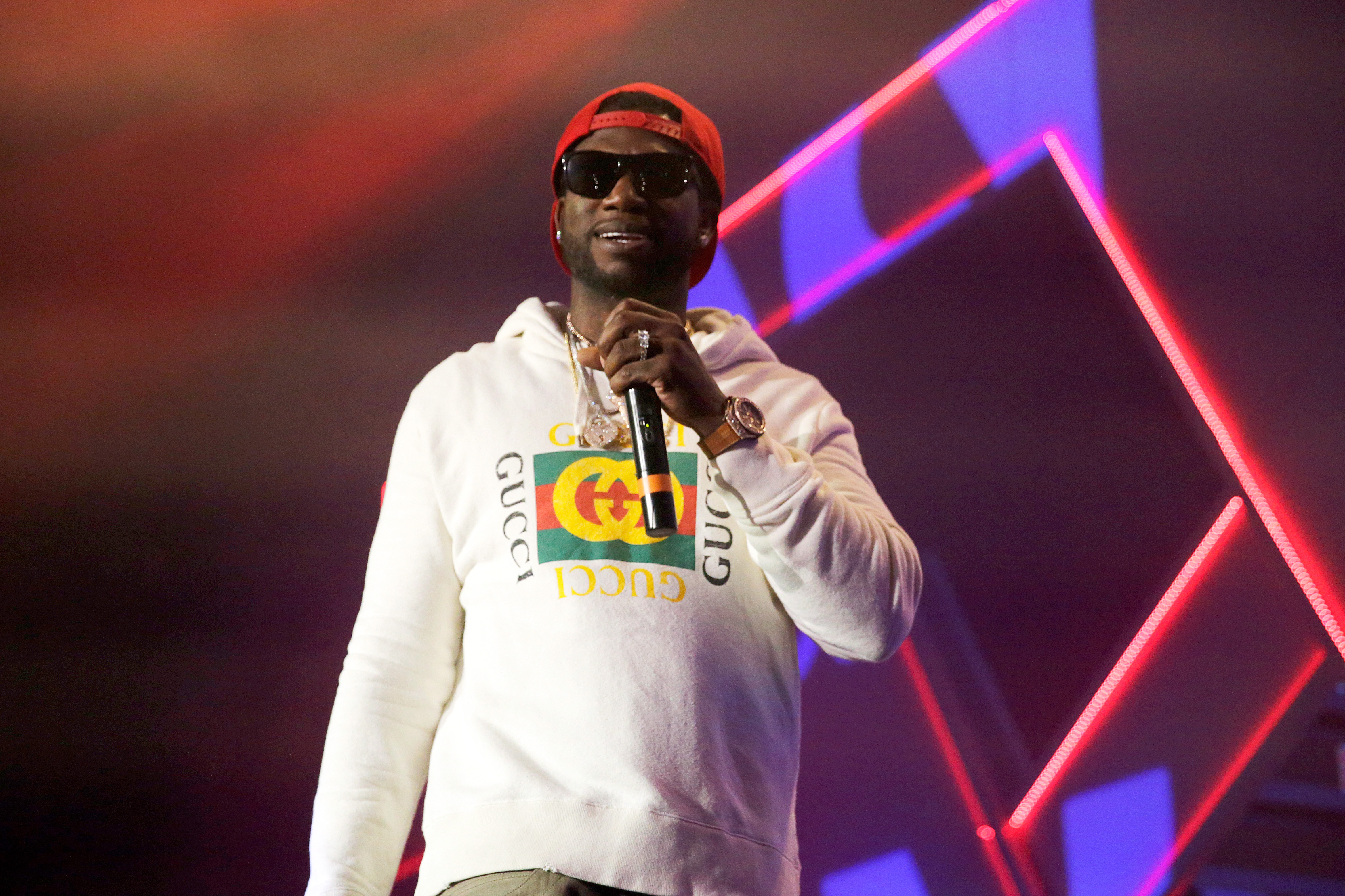 Fan Tackled By Security After Crashing Stage At Gucci Mane Concert