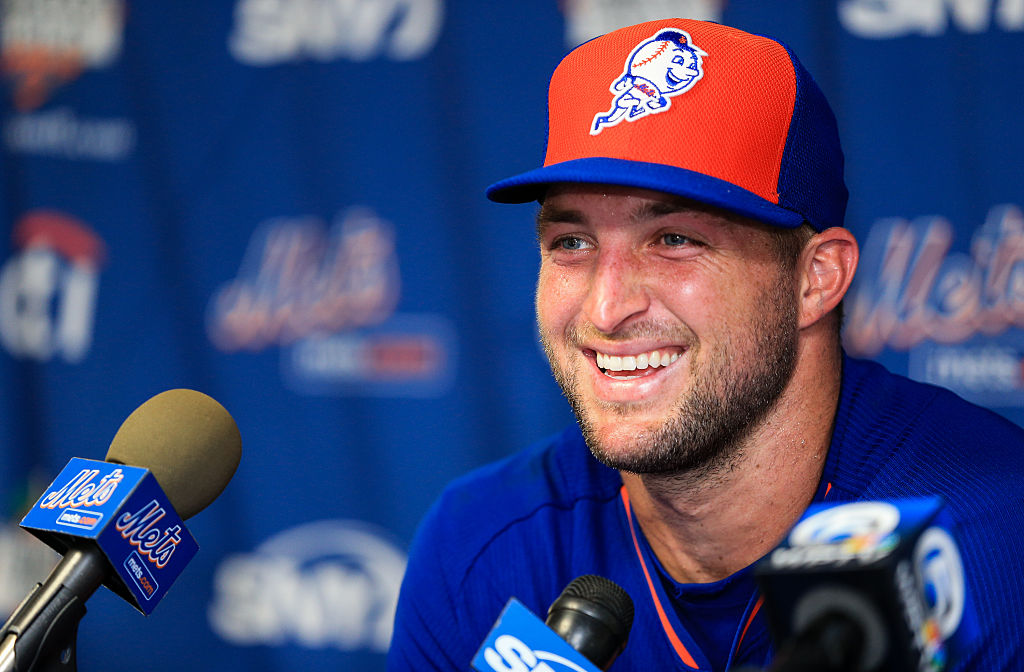 Tim Tebow Prays Over a Fan Who Suffers a Seizure