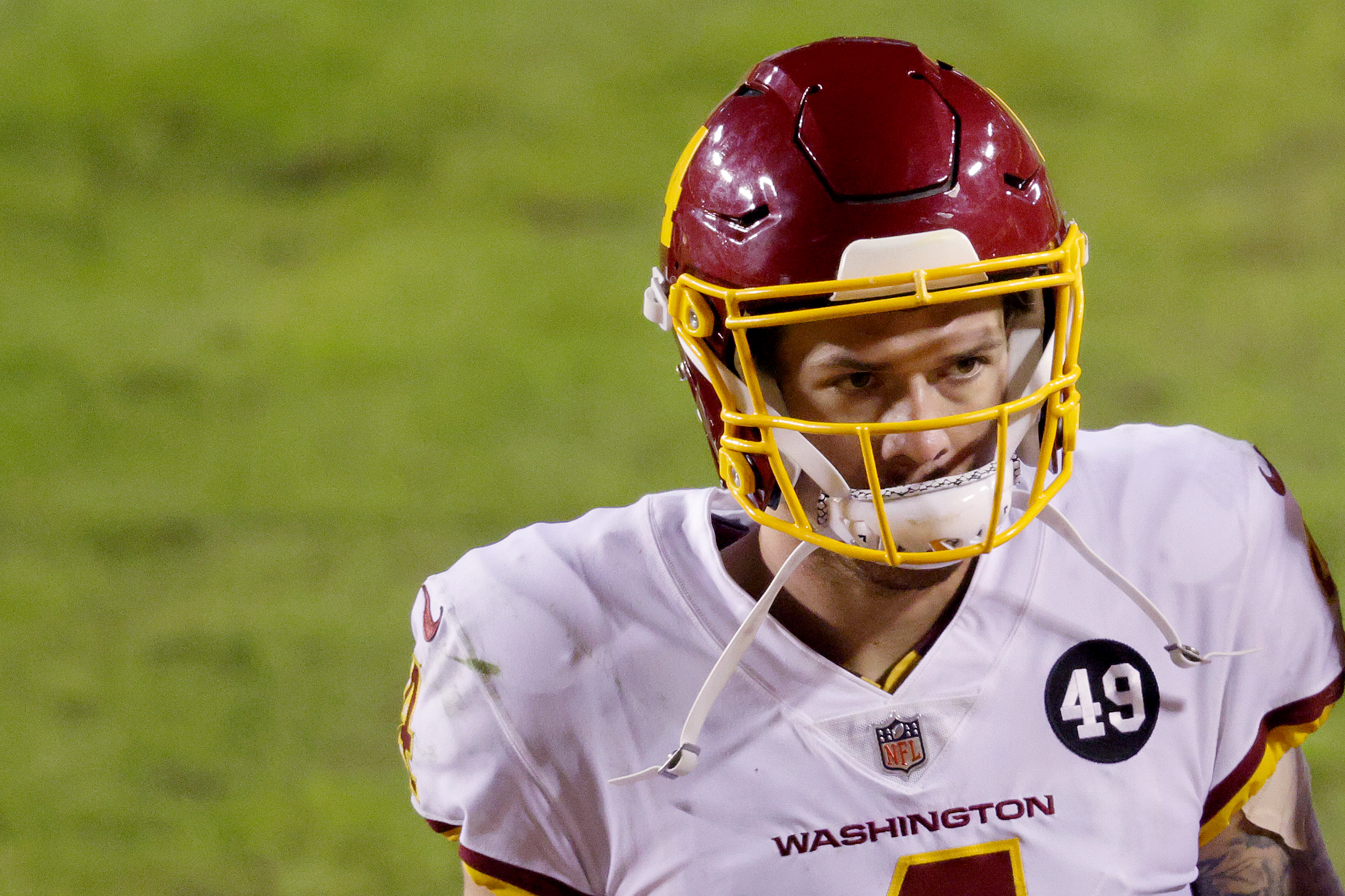 Washington Football Team quarterback Taylor Heinicke slams helmet