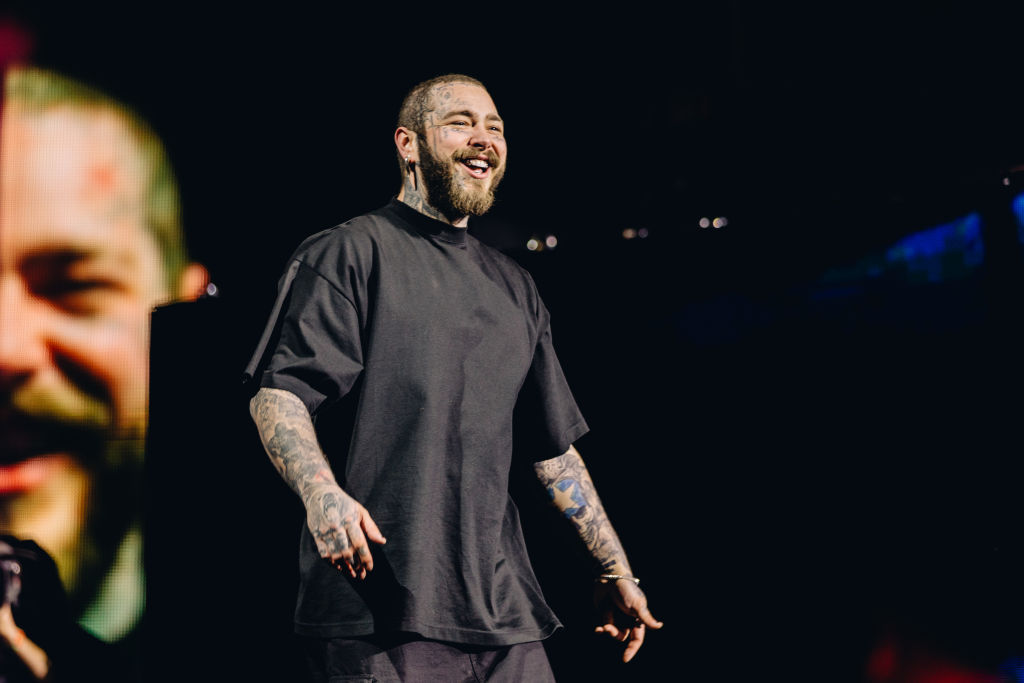 Post Malone Wears A Camo Dress Backstage At “SNL,” Debuts Emotional New Song With Fleet Foxes