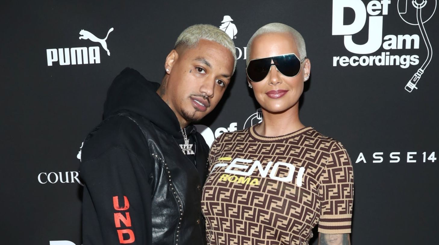 Amber Rose Shows Off Growing Baby Bump In Leopard Print Catsuit