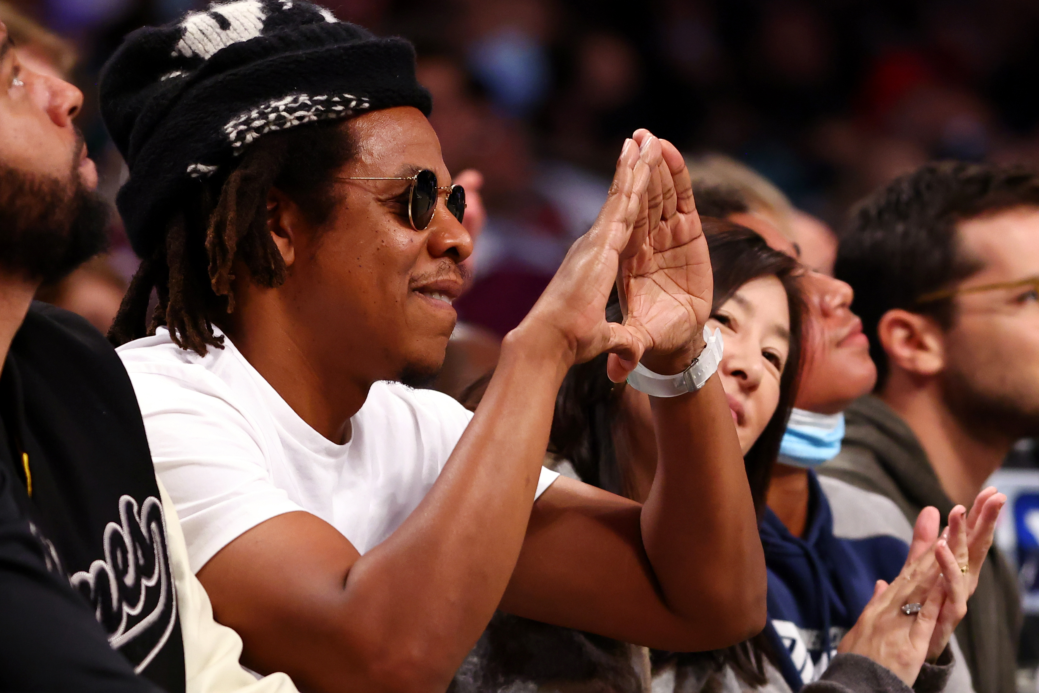 Jay-Z Sits Courtside At Nets & Gets A Drink Spilled On Him