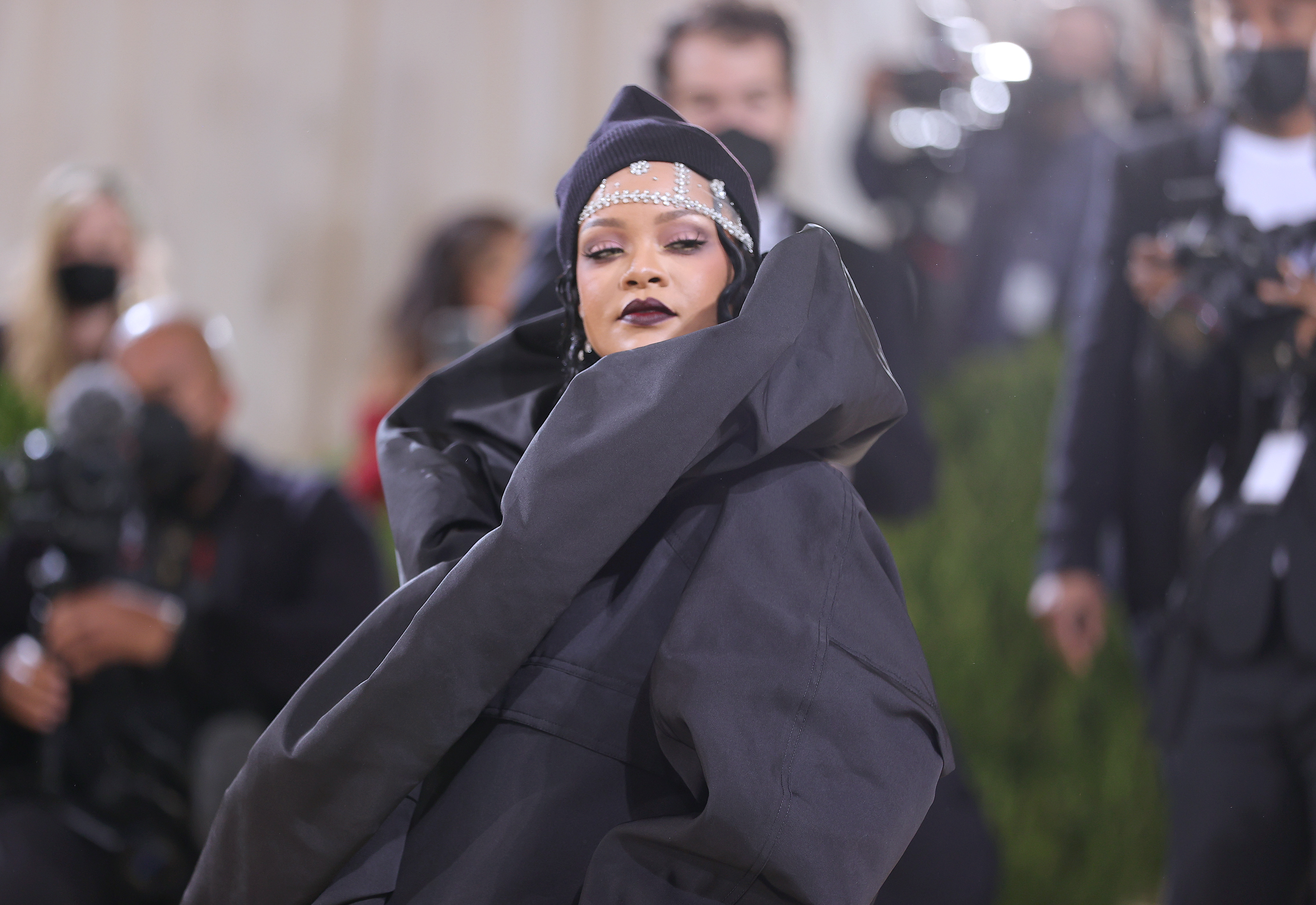 Rihanna tells paparazzi that new music is coming soon soon soon