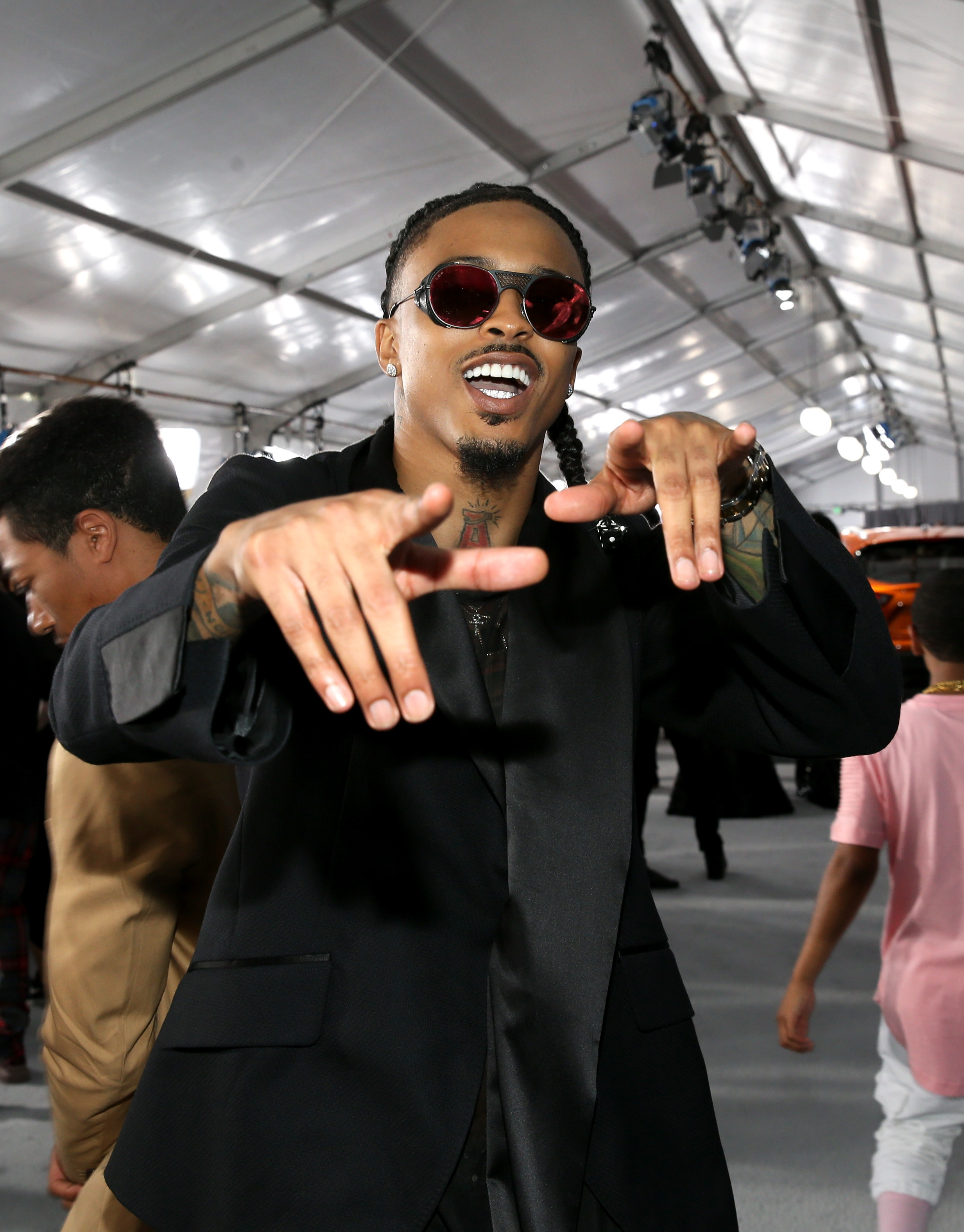 August Alsina Allegedly Flashes Gun At Fans To Stop From Being Harassed