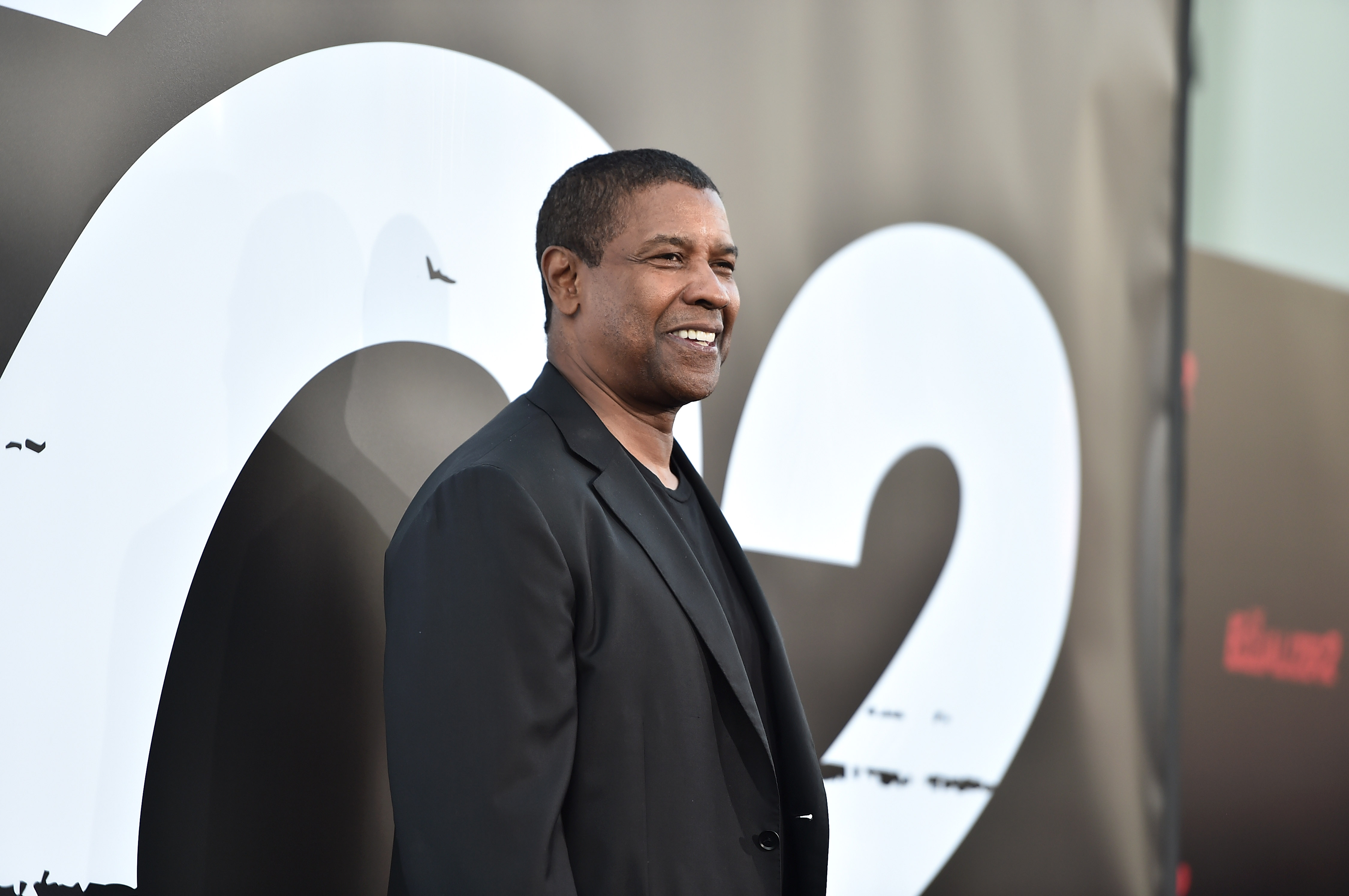 Denzel Washington 'Glad' His Son Quit Pro Football