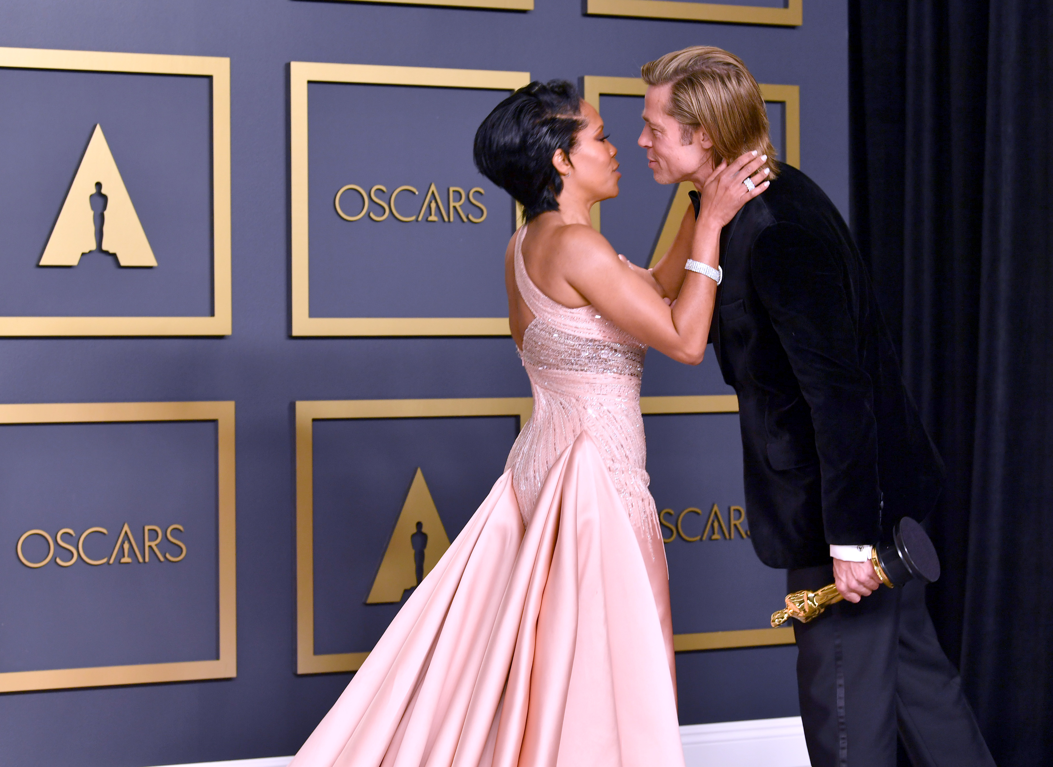 Brad Pitt & Regina King's Oscars Kiss Has Fans Wanting More
