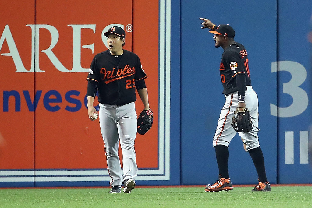 Baltimore Orioles Adam Jones celebrates with fans after the Orioles won the American  League East championship, defeating the Toronto Blue Jays 8-2 at Orioles  Park at Camden Yards in Baltimore, Maryland on