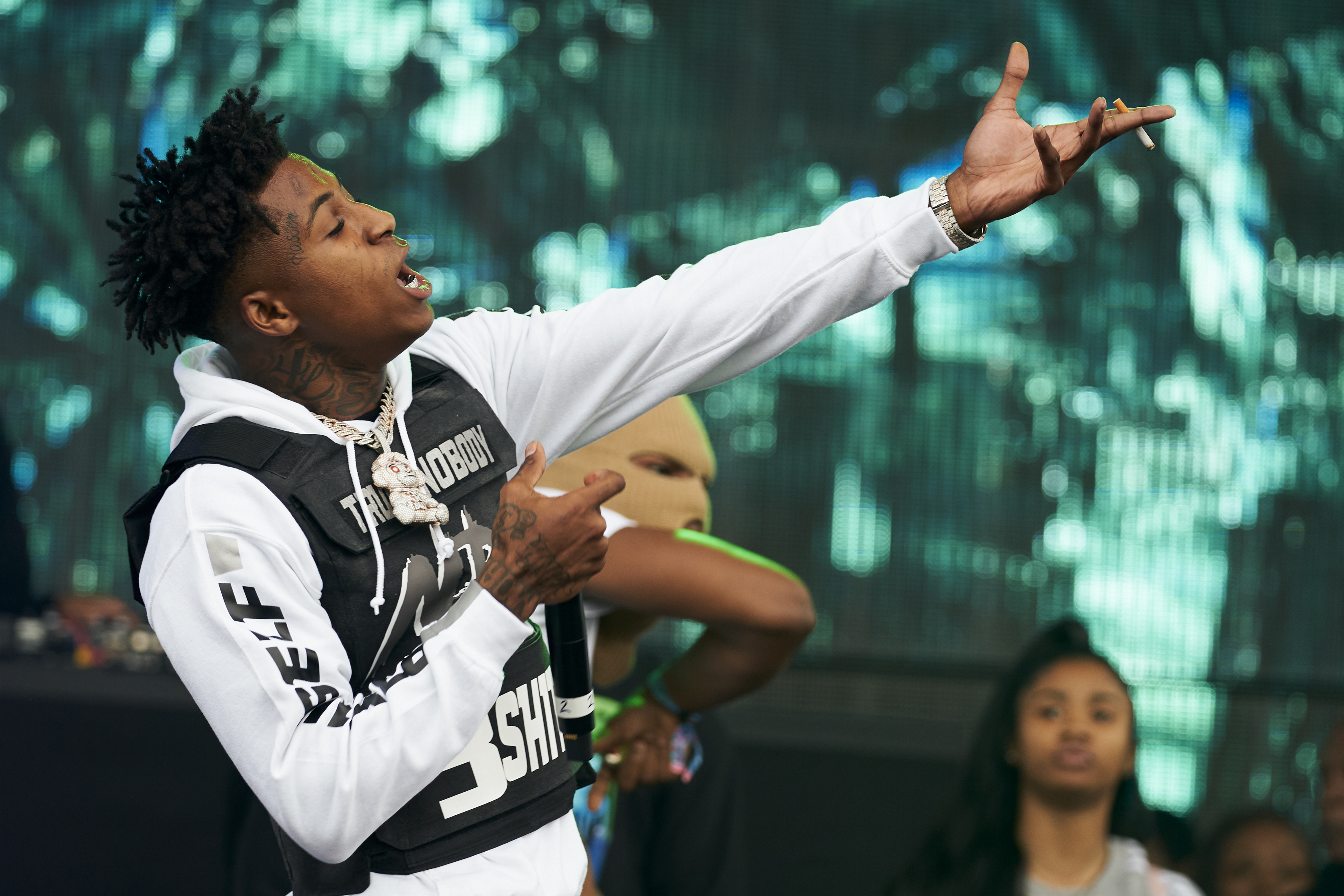 NBA Youngboy Is Wearing Black White Dress Standing In Black