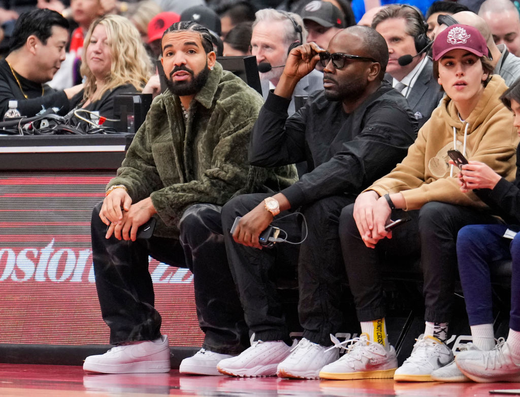 Drake wearing 🎩 Nike Swoosh Headband ($6) 🧥 Nike × Drake Nocta