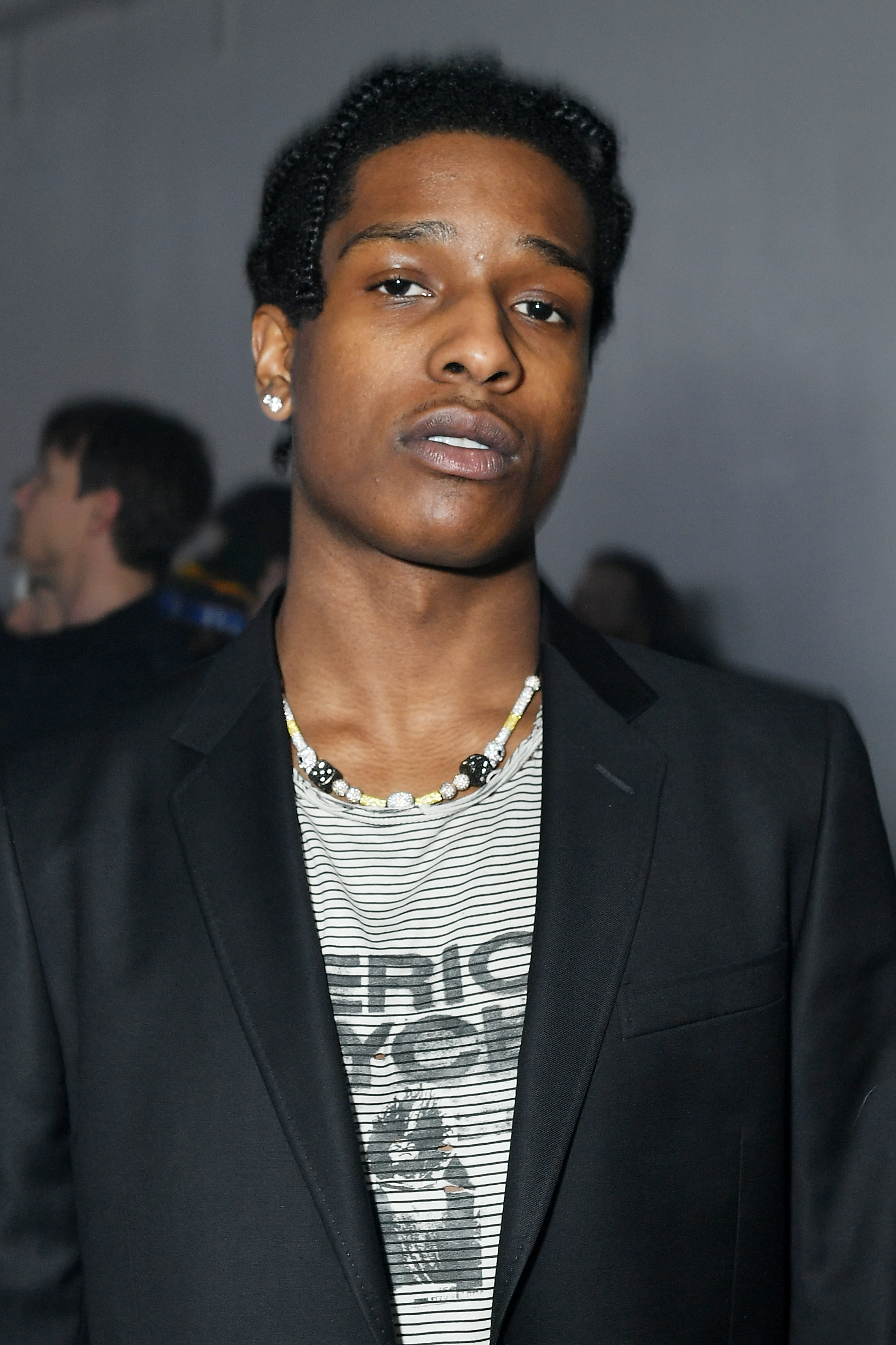 GQ Australia - Even when ASAP Rocky steps out in a simple suit, he knows  how to accessorize like a champ. Get the run down on the rapper's suit/pearls  combo, and the
