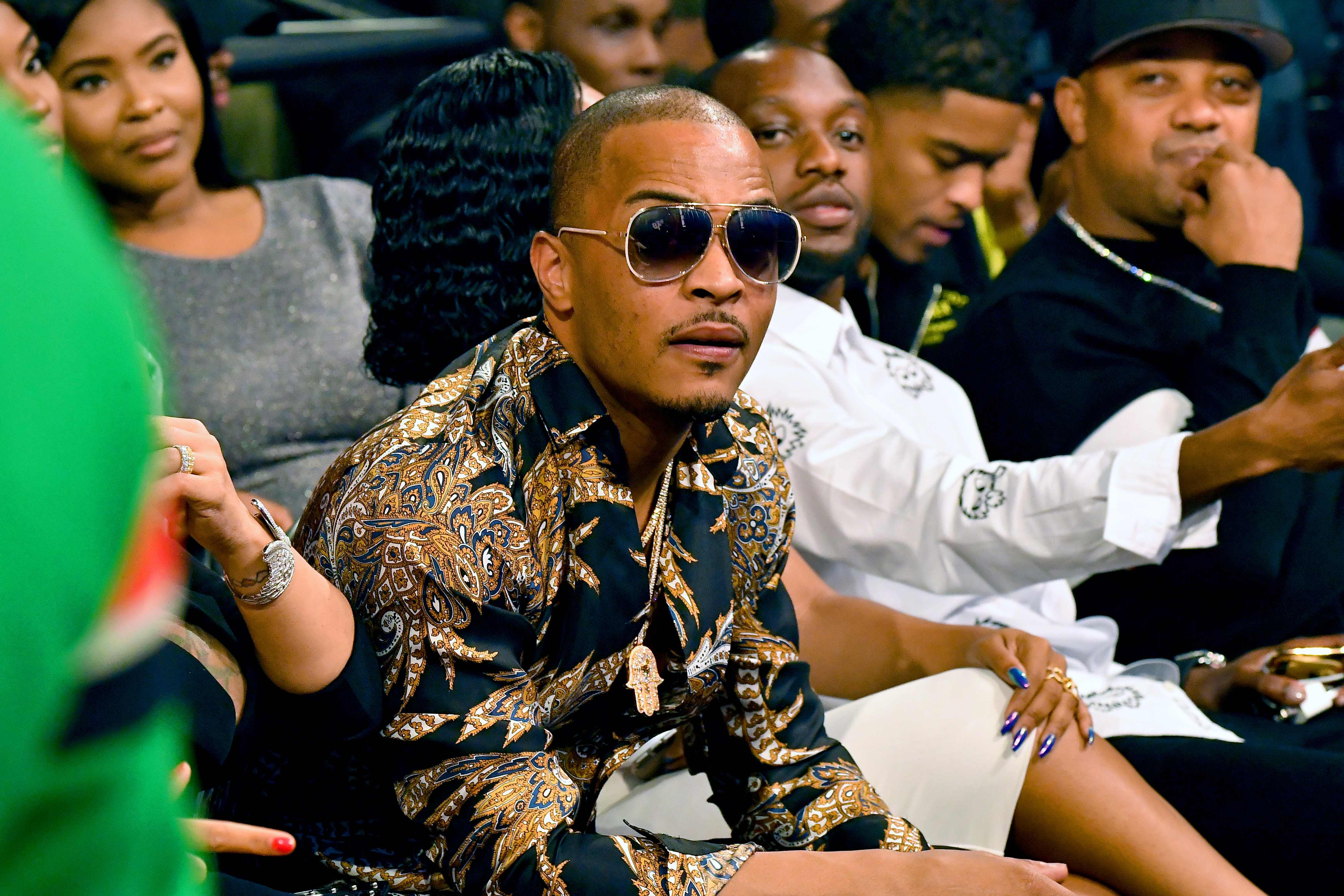 T.I. Pays Fine For Cursing In Public