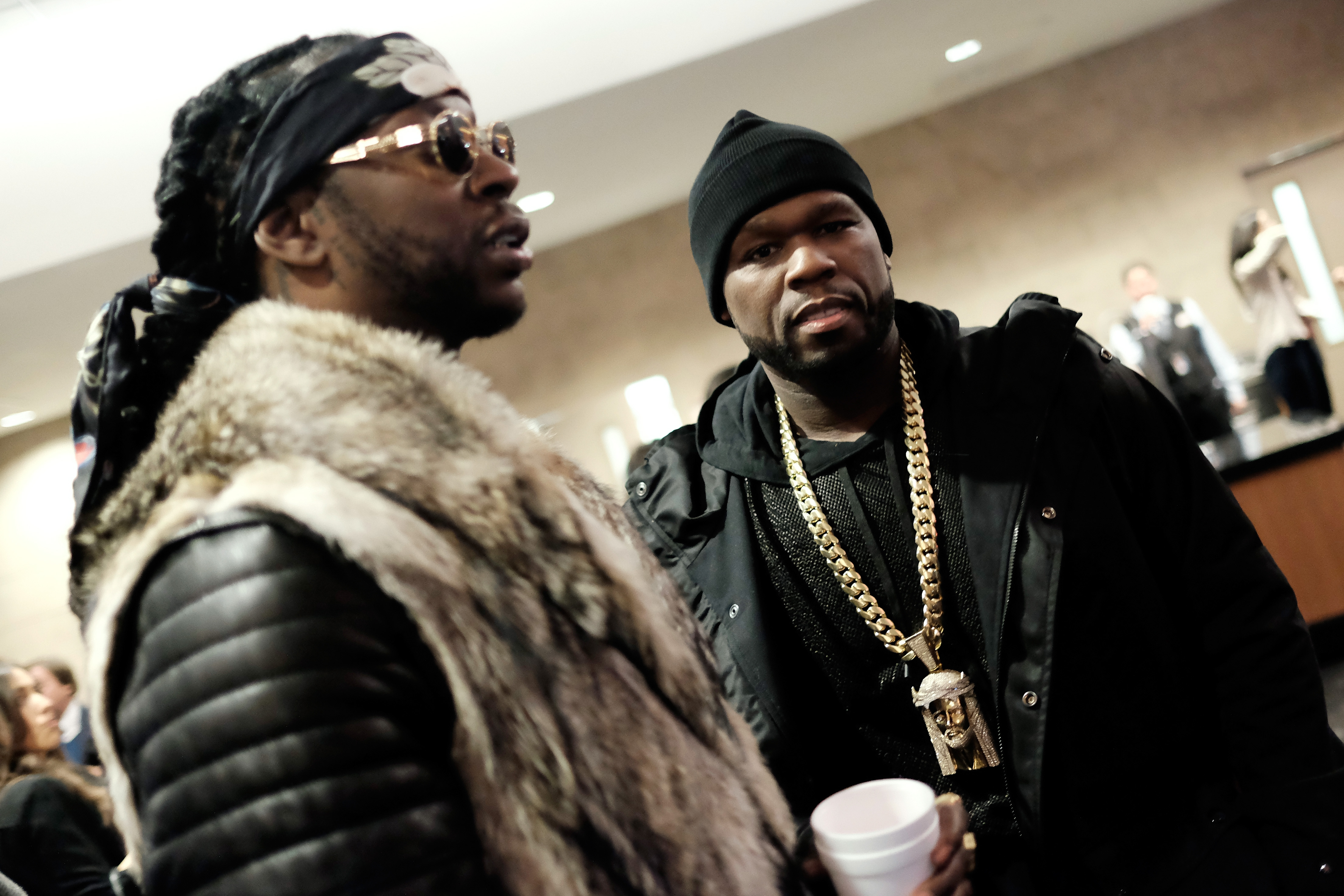 50 Cent Roasts 2 Chainz' Custom Versace Sneakers