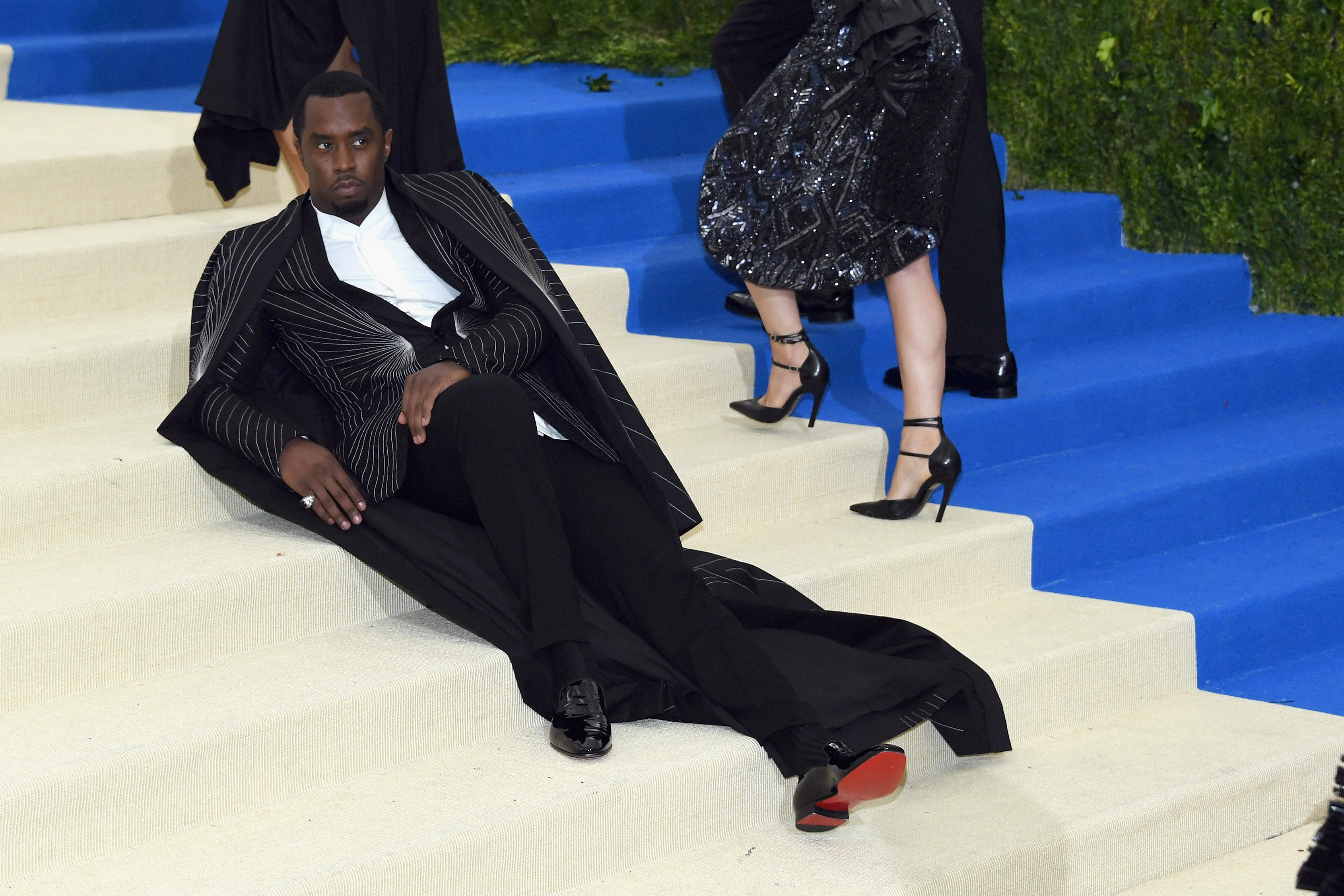 The Best Memes Of Diddy Lounging On The Met Gala Stairs