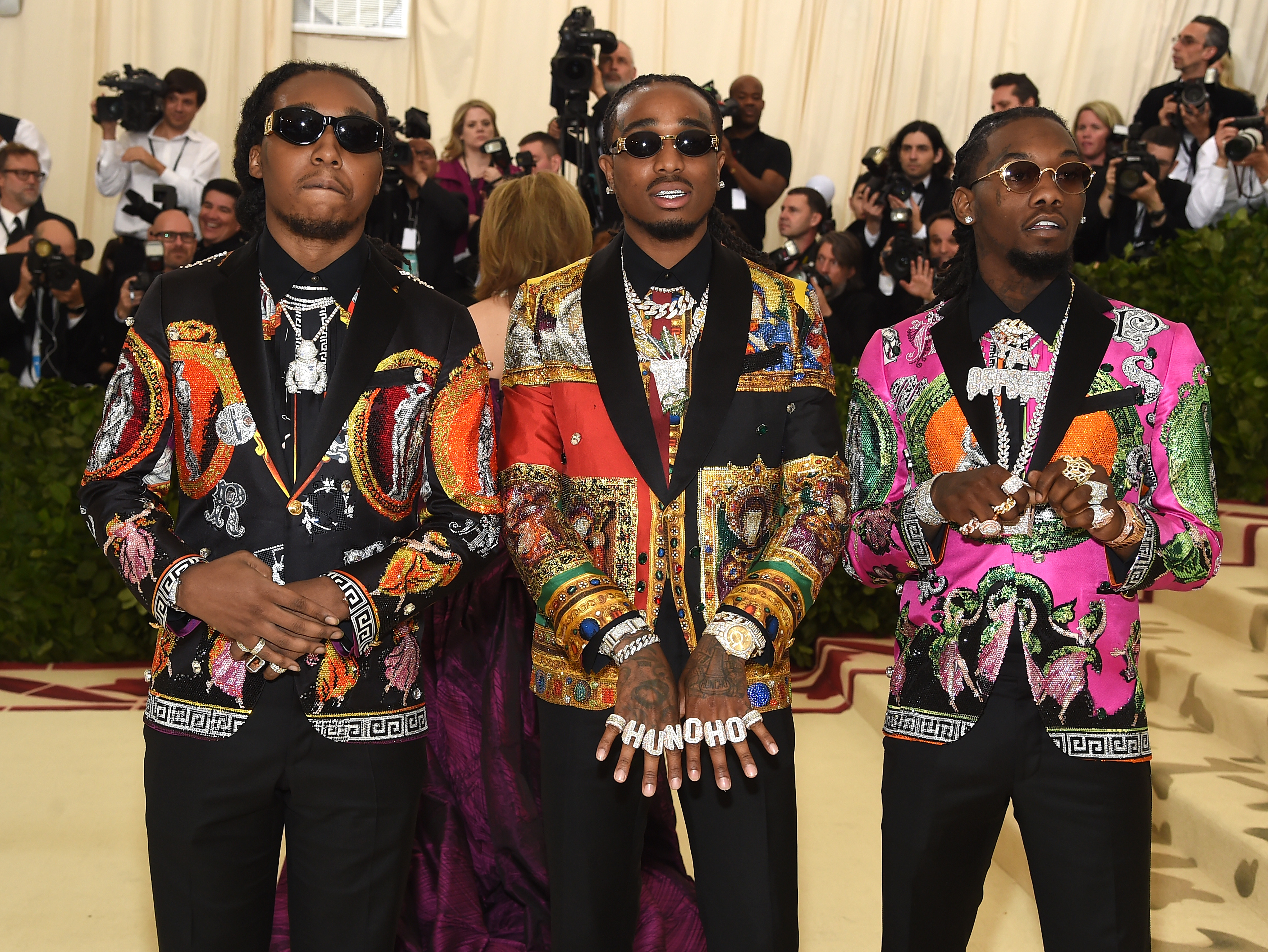 Migos' stylist breaks down their colorful, coordinated tour outfits