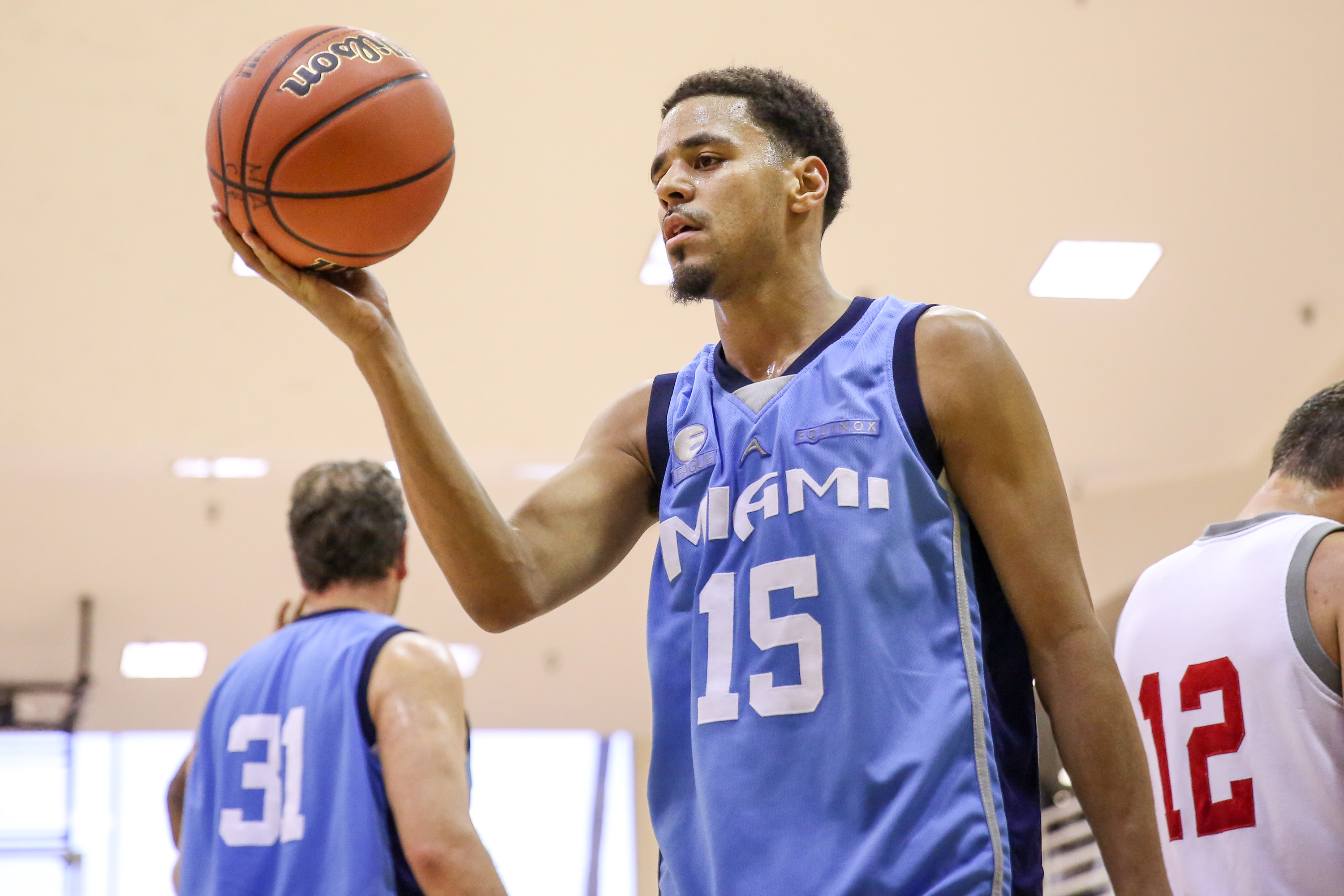 J COLE 15 PATRIOTS VISIT RWANDA BASKETBALL JERSEY