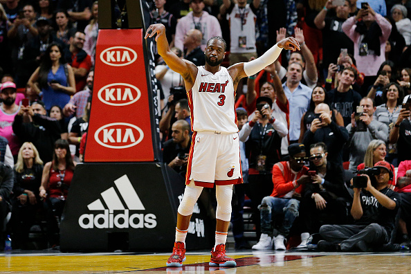 Dwyane Wade's Miami Heat jersey officially retired, goes up to  AmericanAirlines Arena rafters – Sun Sentinel