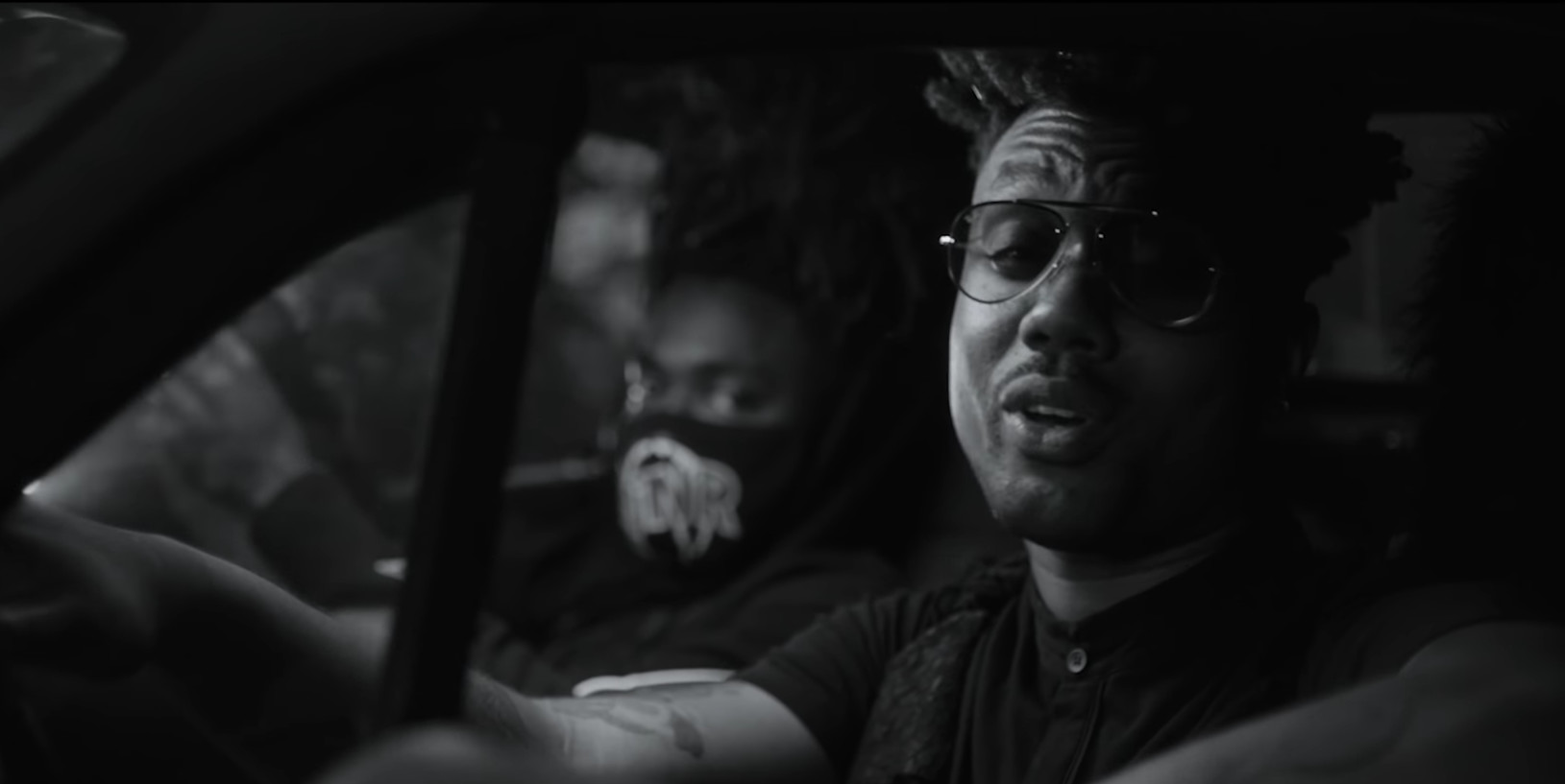 EarthGang Drop Off Cinematic & Eerie Visuals For "Swivel"