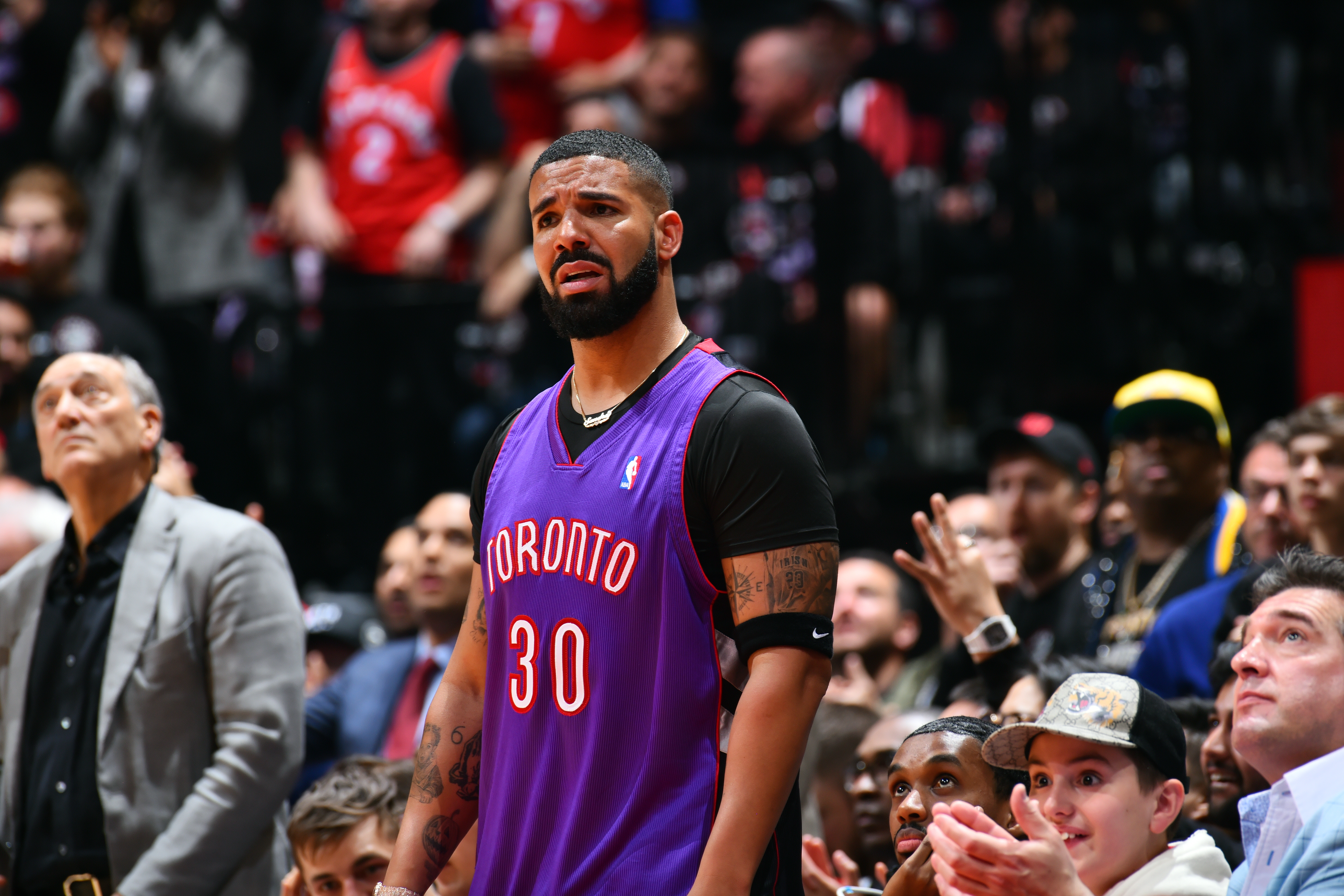 See Drake's Golden State Warriors-themed tattoos